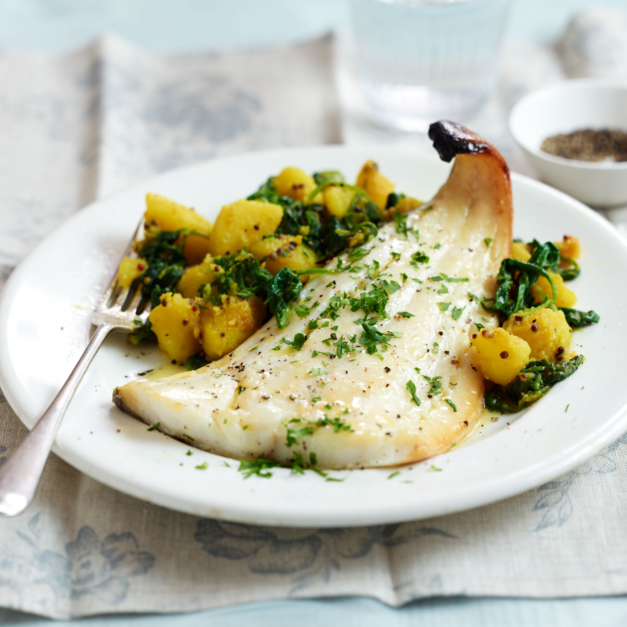 Grilled Smoked Haddock with Spiced Potatoes and Spinach