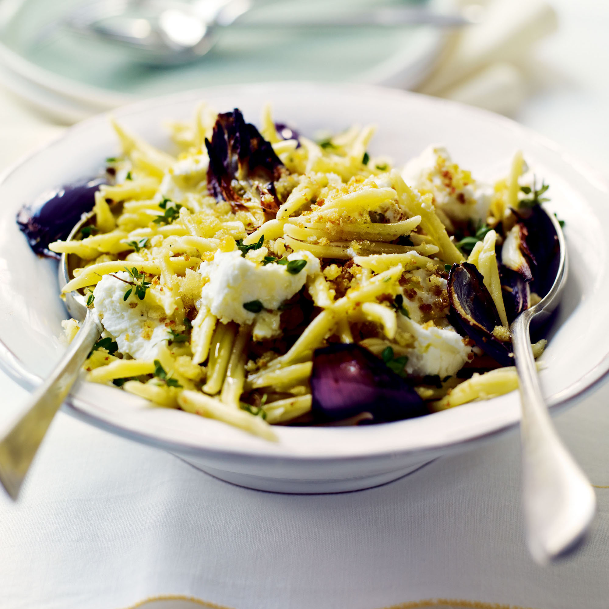 Trofie pasta with roasted red onions and goats' cheese recipe