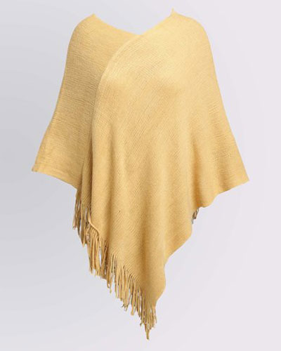 how to wear a poncho pale yellow with fringes