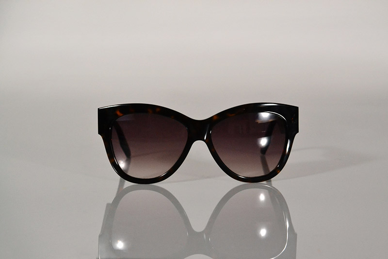 Sunglasses: Tortoiseshell with gold eyelets, from 5 875, MCQ by Alexander McQueen at SDM Eyewear