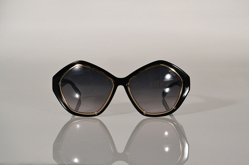 Sunglasses: Geometric black and gold, from R3 975, Emilio Pucci at SDM Eyewear