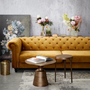 gold couch in lounge