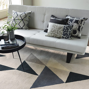 carpet and cushions with geometric shapes