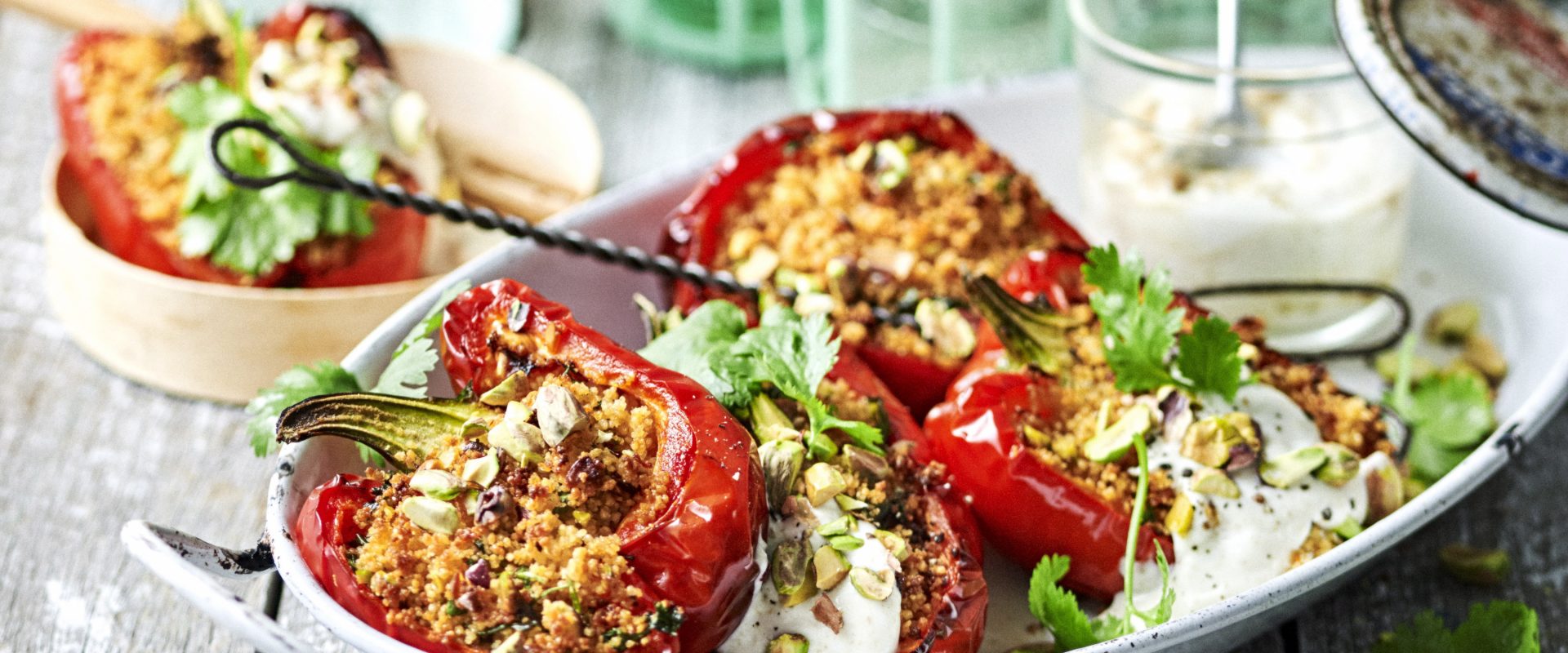 Peppers stuffed with pistachio-harissa couscous
