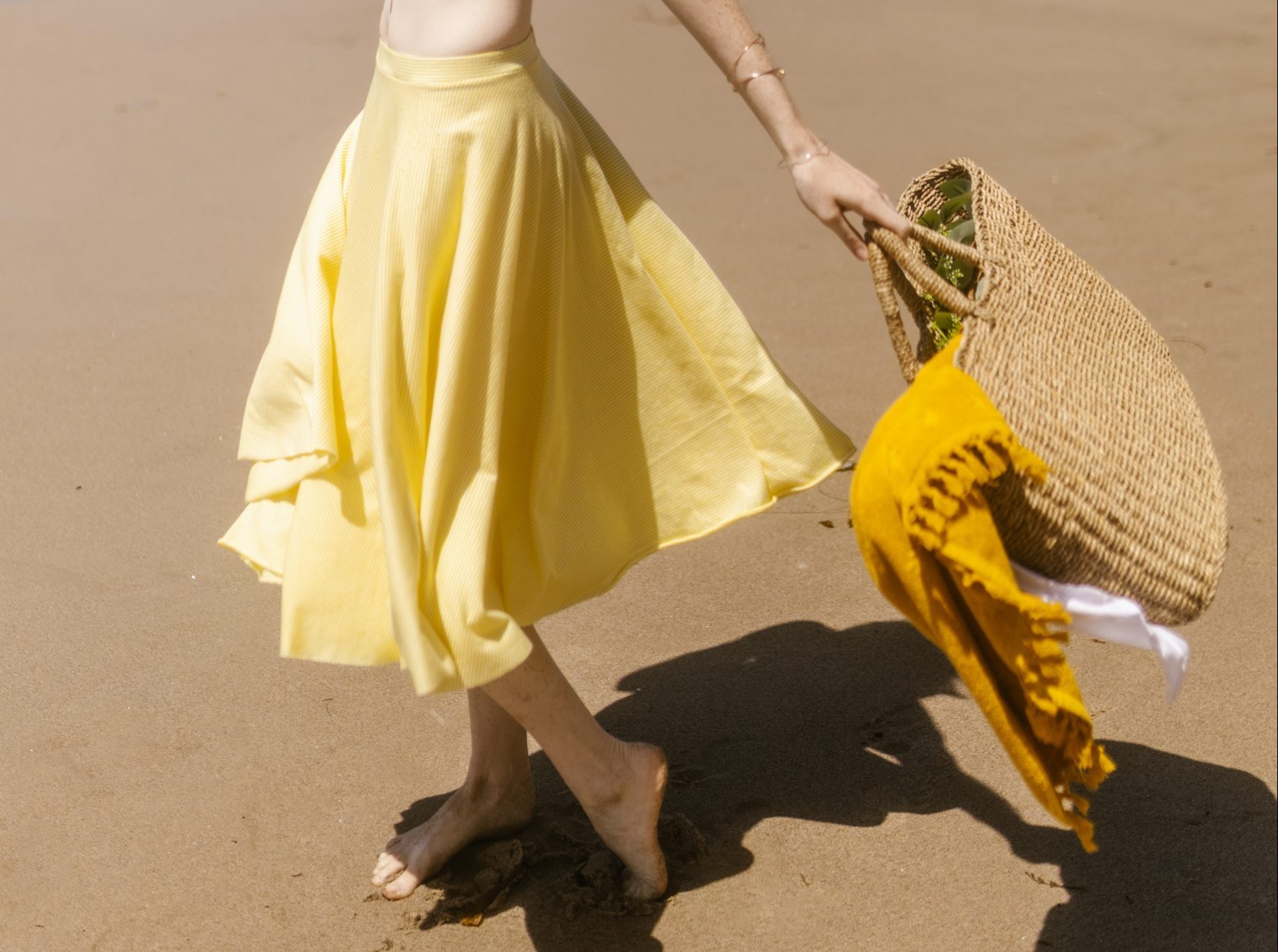 Beach staples What does a beauty editor pack for the beach? Woman
