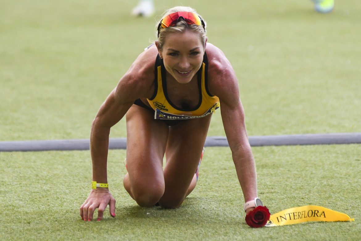 A resilient mom crawls over the Comrades Marathon finish line