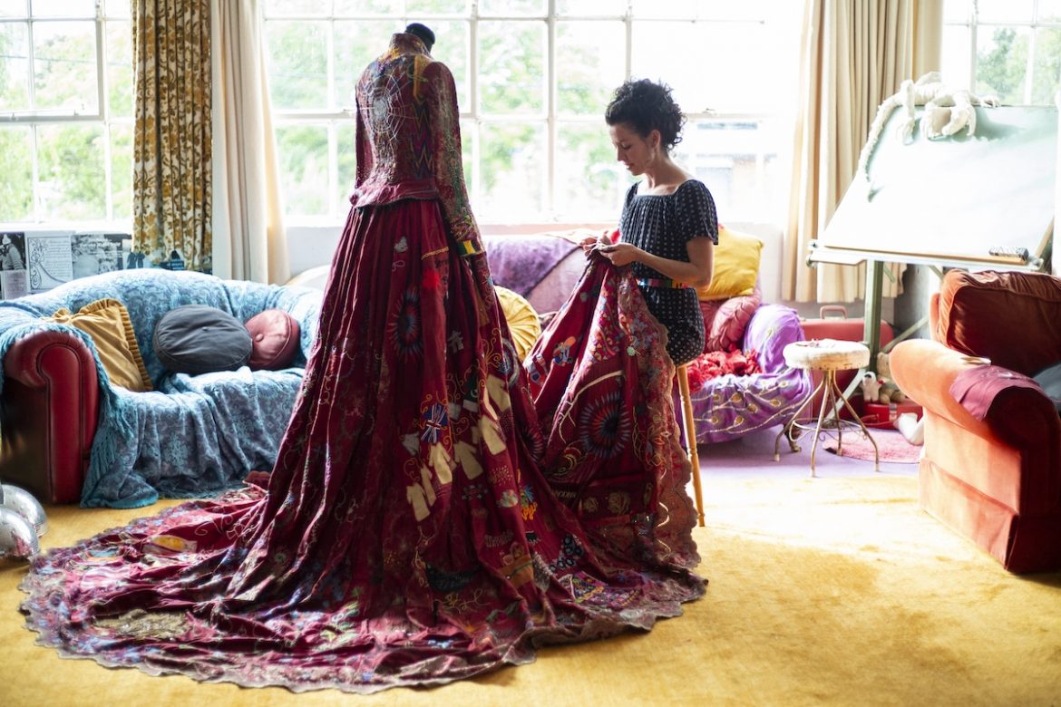 This ornate red dress took 13 years and 353 artists in the making