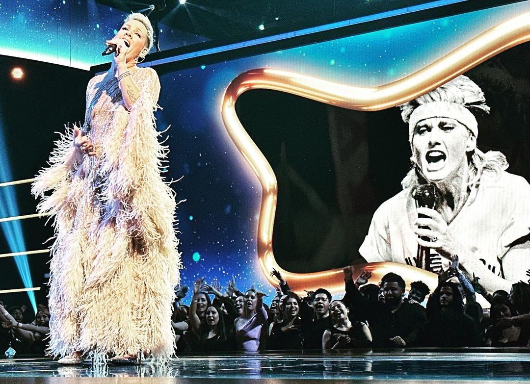 Pink shows her ‘hopeless devotion’ to Olivia Newton-John