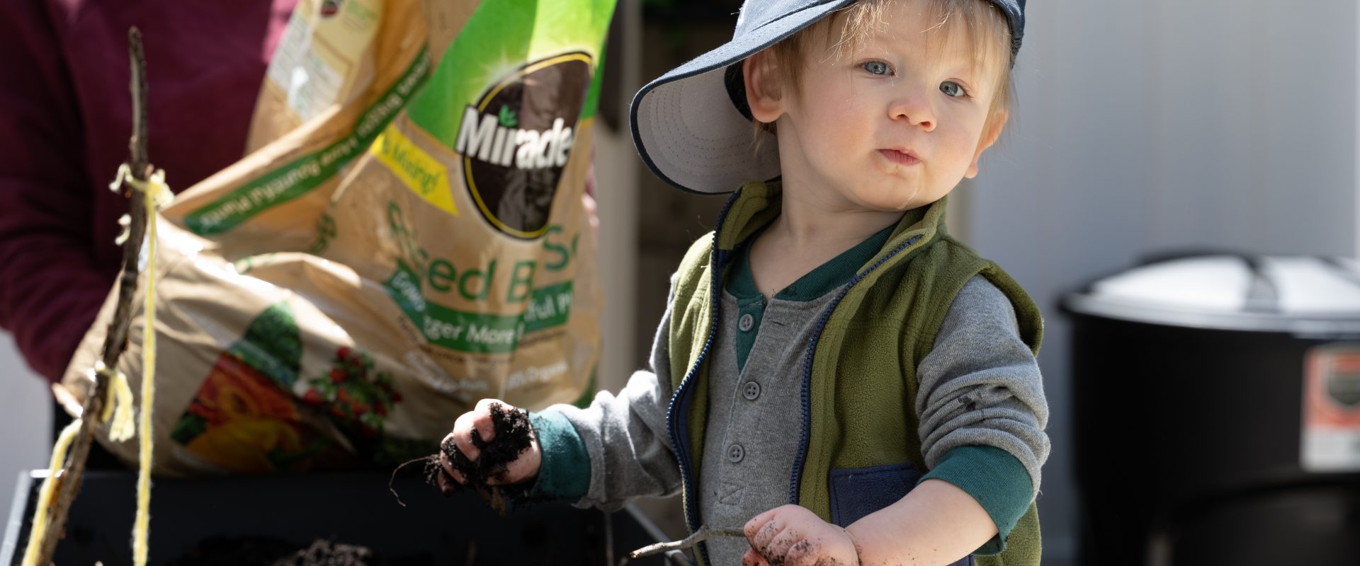 a little boy gardening