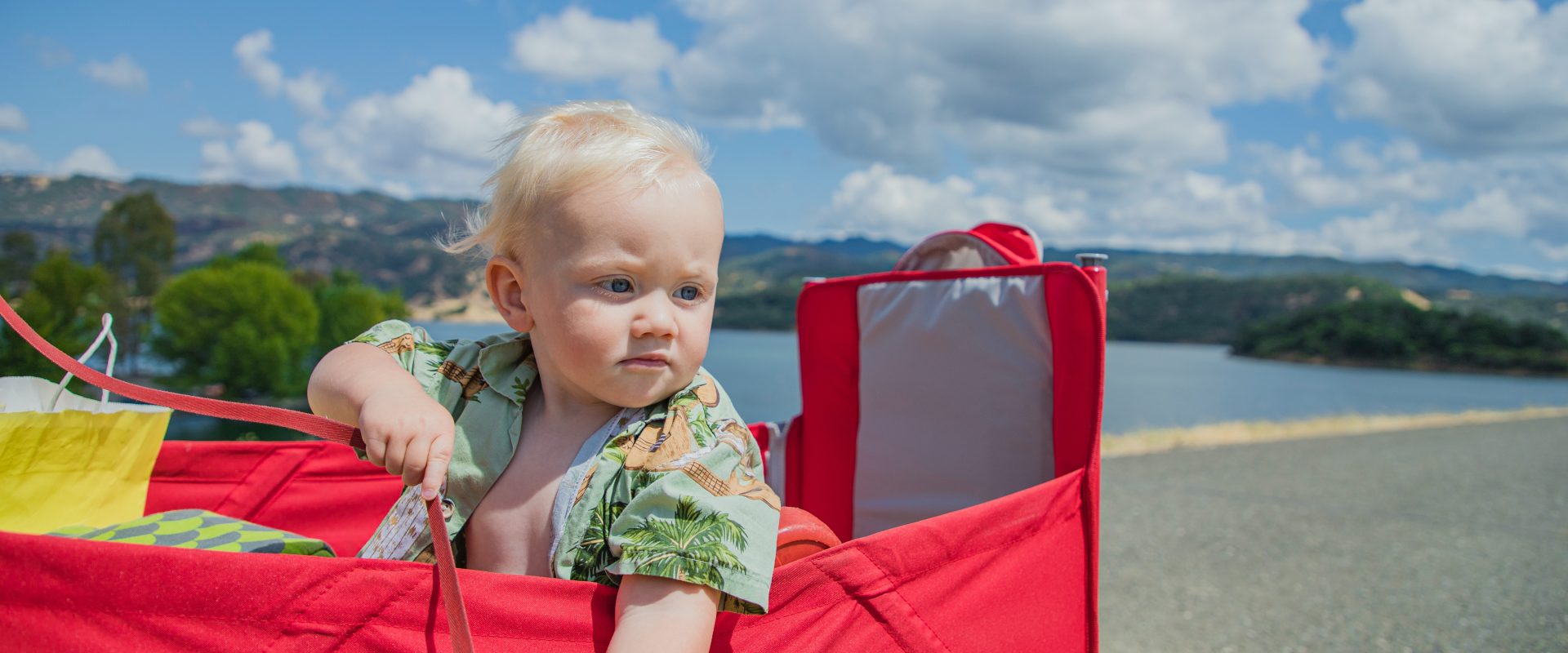 a little baby in a travel pouch