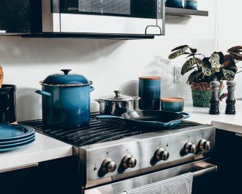 a kitchen with blue appliances
