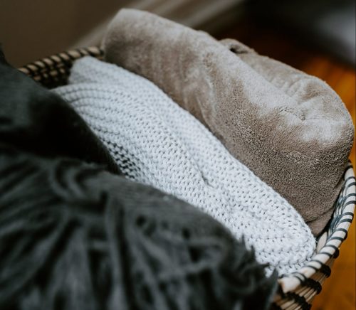 5 storage hacks for stowing winter blankets away