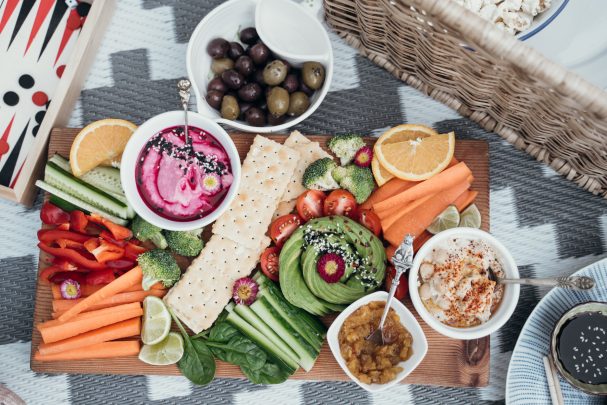 a picnic basket with fresh food