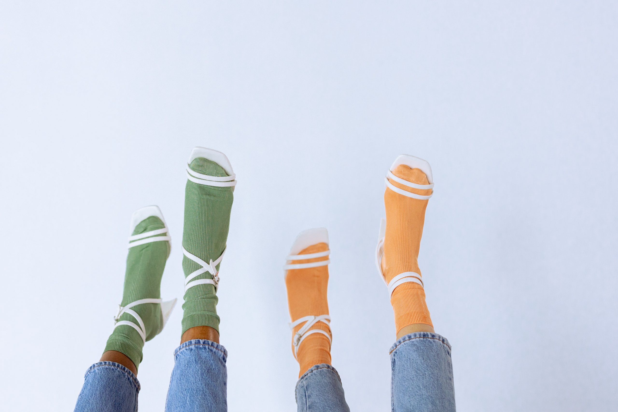 Green and Orange socks in White heels