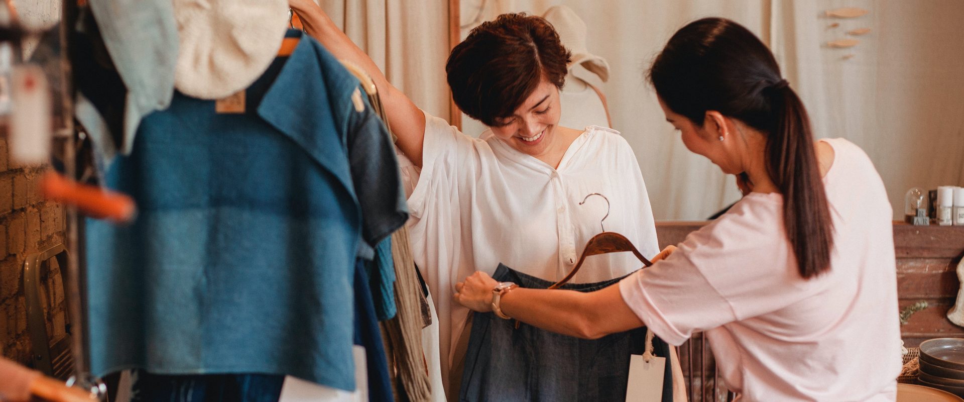 Woman looking at clothes based on colour theory