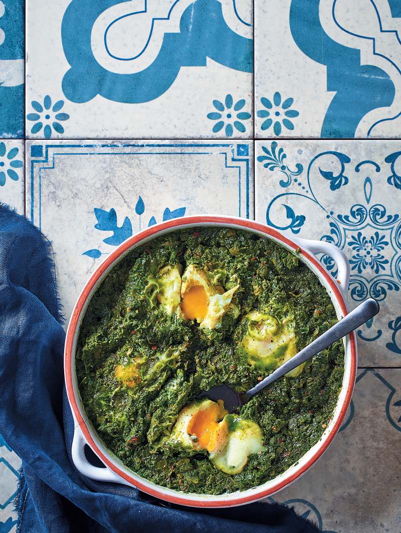 Herb and spinach green shakshuka