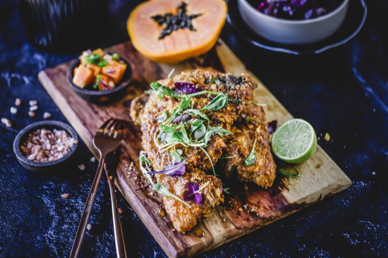 Panko & parmesan-crusted pork chops with papaya salsa